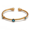 bracelet jonc oeil bleu grec torsade or