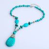 collier pendentif amulette pierre turquoise